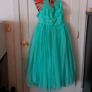 I'm selling a party dress hand made worn once for a birthday. This has no brand.